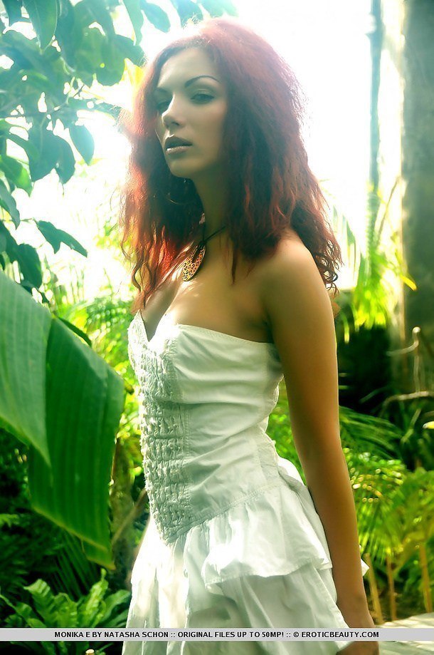 Cheeky redhead Monika E in Tropical botanic garden