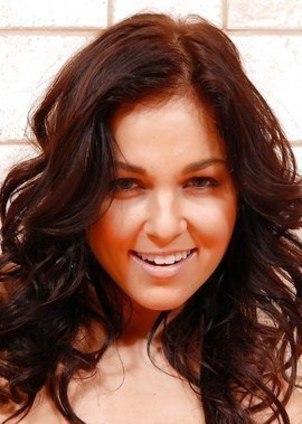 Curly brunette cutie enjoys hand in her horny twat