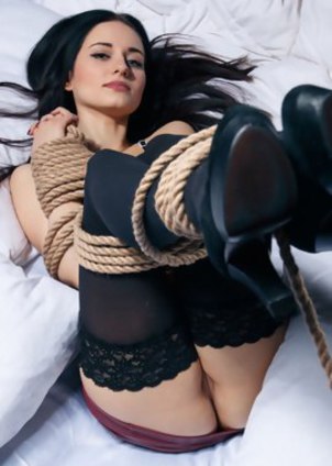 Kinky bondage lover Eva Kahil roped