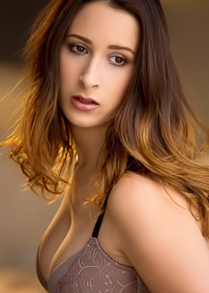 Ashley Adams Gentle Ashley Adams takes seductive positions on camera