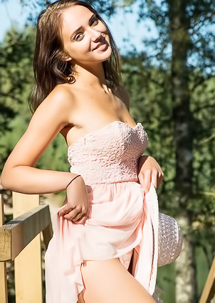 Amazing brunette is happy to get naked