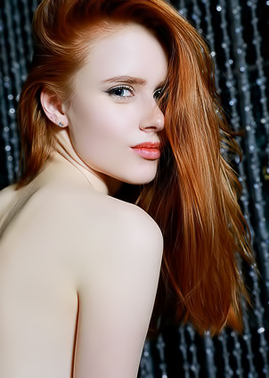 Skinny babe spreads legs to show pussy