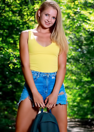 Gabriella - Blonde stunner gets naked during a nature walk