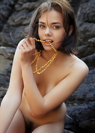 Keira Blue - Skinny brunette takes off her dress and poses nude on rock