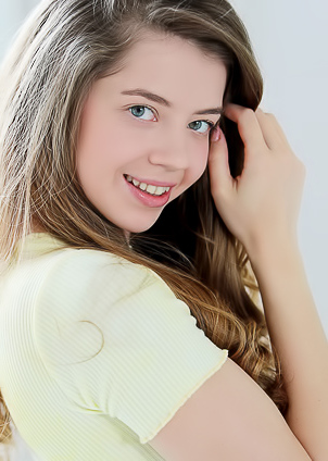 Kay J Spreads Her Thighs To Expose Her Shaved Pussy