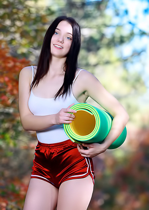 Polly Pure Exposing More Of Her Shaved Pussy