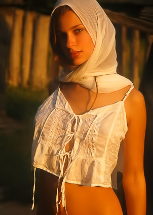 Half-naked chick spends time with a stallion.