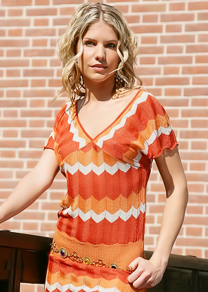 Blondie walks out totally naked to enjoy sun.