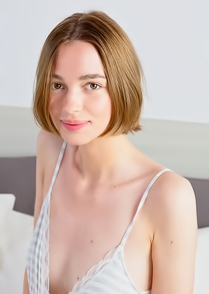 Amy Moloko Spreading Her Slender Thighs For An Intimate View Of Her Shaved Pussy