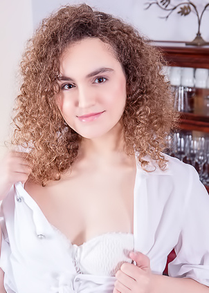 Curly Chick Konstance Shows Tits