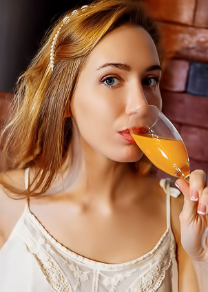 Sexy Redhead Madelina Bare Her Beautiful Breasts