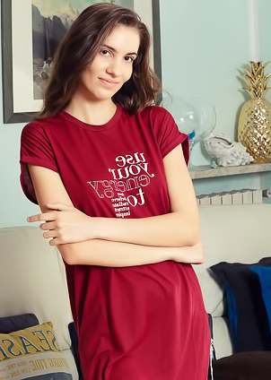 Lili Charmelle Revealing The Intricate Folds Of Her Shaved Pussy With A Smile