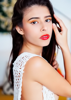 Mell Blanca Bending Over To Flaunt Her Firm Round Ass