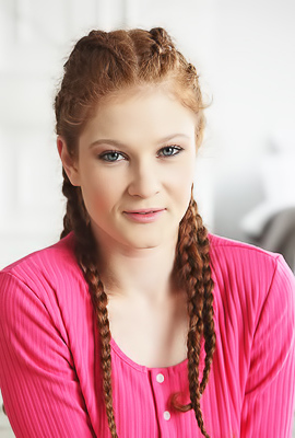 Foxy Sofilie Cute Redhead Unfastens Her Bodysuit