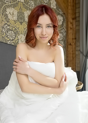 Rosalind Parts Her Slender Thighs To Frame Her Shaved Pussy