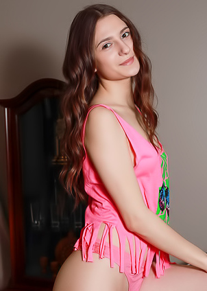 Sexy Brunette Afina Exposing Her Shaved Pussy And Curvaceous Ass