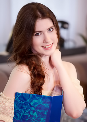 Pearl Spreads The Delicate Pink Folds Of Her Shaved Pussy