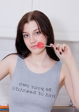 Enid Her Perfect Breasts And Fluffy Bush Exposed Without Inhibition