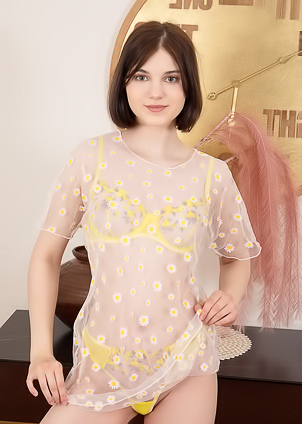 Sara Celeste Bending Over To Show How Her Thong Panties Nestle Between Her Perfect Buns