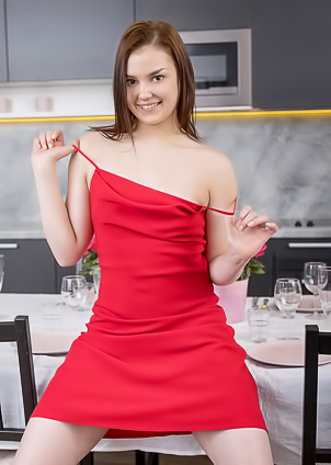 Vanda Sugar Sampling One Of The Juicy Oranges From The Fruit Bowl