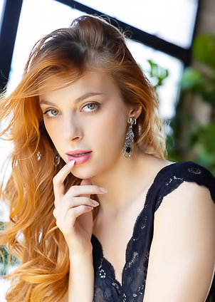 Naty Evans Entices In Revealing Striptease Showcasing Lustful Curves