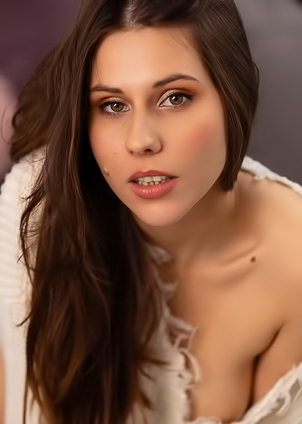 Amber Slassh Teases With Perky Nipples And Spread Legs On The Couch